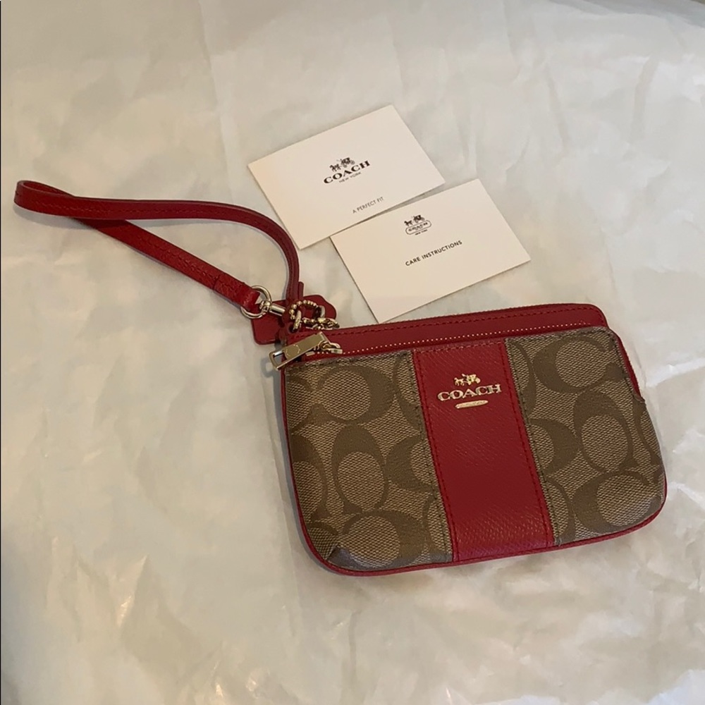 Brand new red and brown coach wristlet